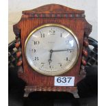A small oak mantle clock