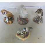 A Royal Crown Derby Barn Owl, another owl, Blue Tit group and a pigeon (all boxed)