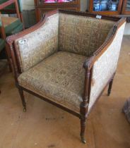 An Edwardian square mahogany chair acanthus leaf arm ends