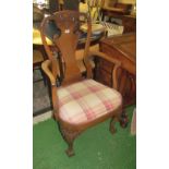 A walnut carver chair on cabriole legs