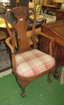 A walnut carver chair on cabriole legs