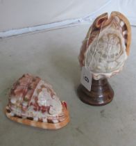 A carved conch shell with Italian cameo carving and similar lamp