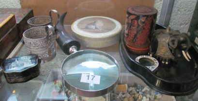 A horn handle magnifying glass, small cloisonné magnifying glass, ebony tray, elephant with metal