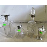 A silver top scent bottle, castor and pair of tall decanters (one no stopper)