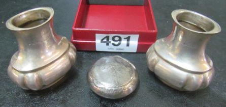 A silver pill box and two silver salts (no lids)