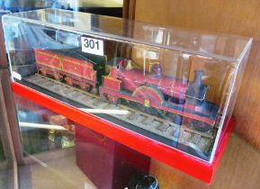 An Edwardian card and wood model of locomotive original wooden base in modern perspex display case