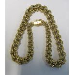 A yellow metal necklace intricate circle link design marked 14k 49.4g
