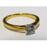 An 18ct half carat diamond ring 3.8g