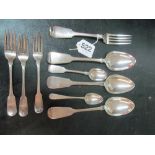 Three Georgian silver serving spoons, Irish silver table fork, three Irish silver dessert forks