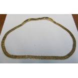 A gold coloured necklace marked 750. 66.6g