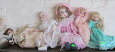 Some porcelain head dolls