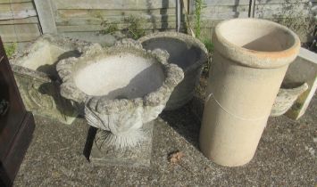 Three stoneware garden pots, a chimney pot and pair demi lune ends