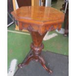 A Victorian walnut sewing table