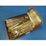 Two sets of fish knives and forks, snuffer tray and spoon