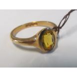 A 9ct gold ring set orange stones 4.6g
