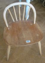 An Ercol dressing table stool with arched chair back (s/a/f)