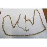 A gold coloured necklace marked 375. with extra silver chain to lengthen 27.7g all in