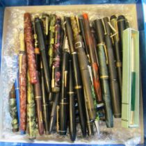 Various mixed vintage pens in blue box