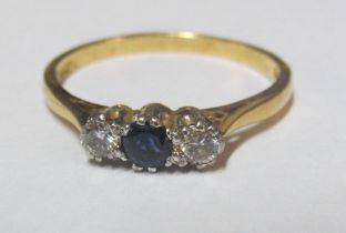 An 18ct gold sapphire and diamond ring 2.9g size S