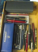 An Onoto marble effect pen, a Waterman pen (i.c), Parker and other pens