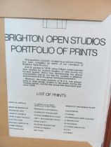 A folio of Brighton prints and folio of Brighton Posters etc and Israeli hands