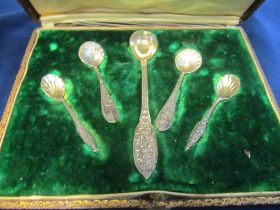A box of small silver spoons