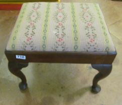 A tapestry top stool