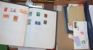 A stamp album and some stamps