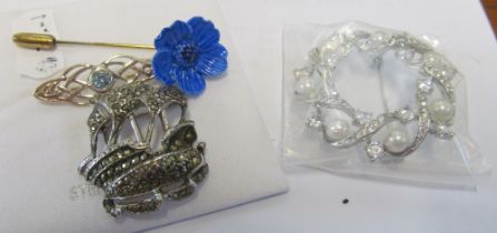 Three brooches and pin