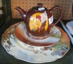 A Royal Doulton 'The Cup that Cheers' teapot and two plates