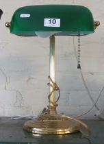 A desk light with green shade