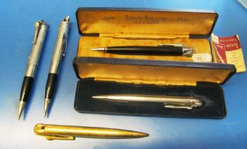 Two Ronson Penciliter, boxed and two other pencil lighters