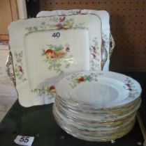 A Fenton set of eleven plates and two dishes floral pattern