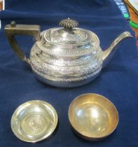 A silver bowl, plated teapot and dish