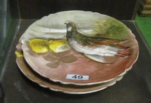 A pair of French porcelain plates dead game