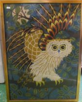 A needlework of an owl