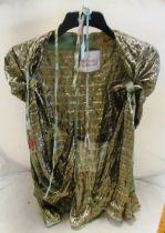 A Vivienne Westwood gold lurex jacket with hood and floral fabric trim