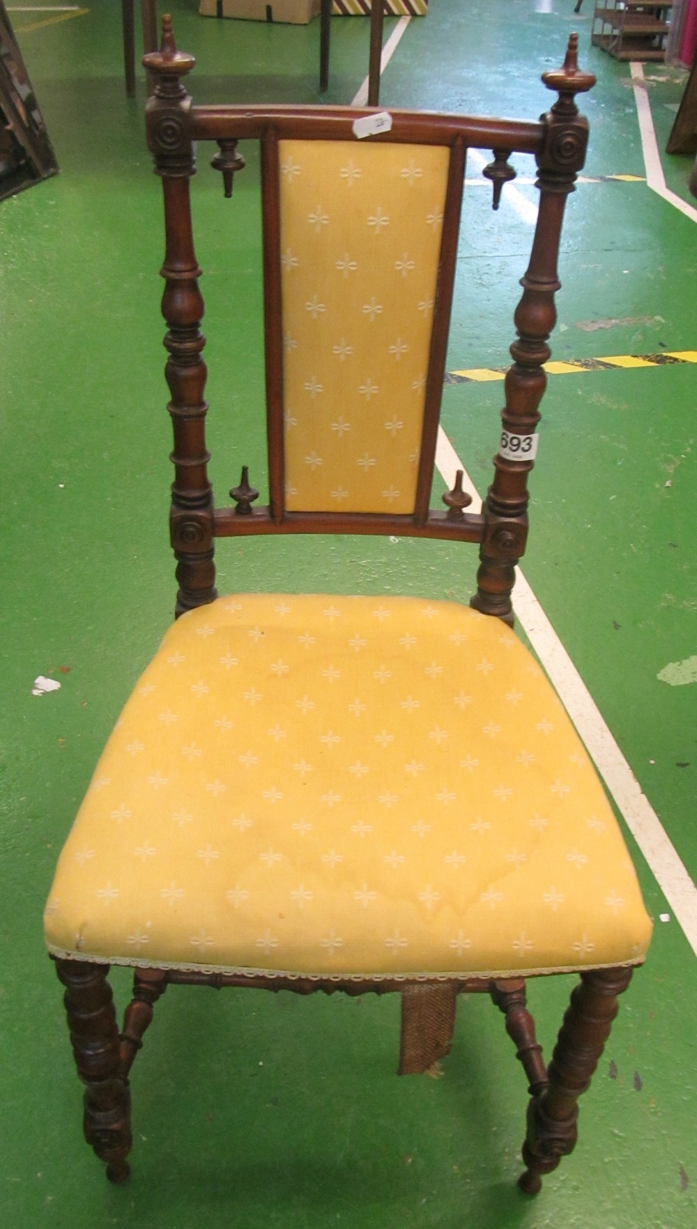 A late Victorian walnut child's chair with turned supports