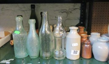 Various stoneware and glass bottles, two from Brighton