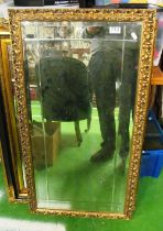 A gilt framed mirror