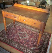 A mahogany two drawer side table