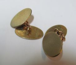 A pair gold cufflinks