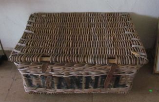 A wicker laundry basket