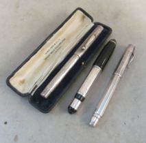 A Swan Mabie Todd Sterling silver pen in original case and two other silver pens