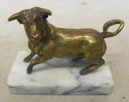 A gilt bronze bull on stand