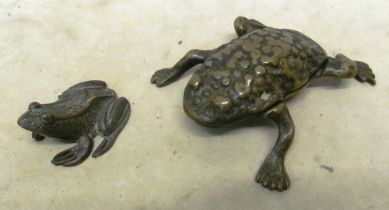 Two metal toads