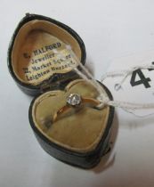 A diamond ring in heart box