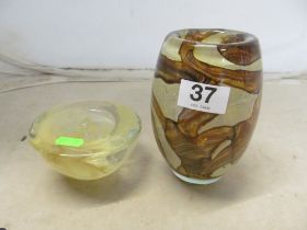 A Mdina 'earthtone' Earth glass vase and a Kosta Boda tealight holder by Anna Ehrner