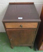 A cabinet supposed for storing honey with brass beading and vent to back