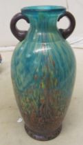 A glass two handled vase